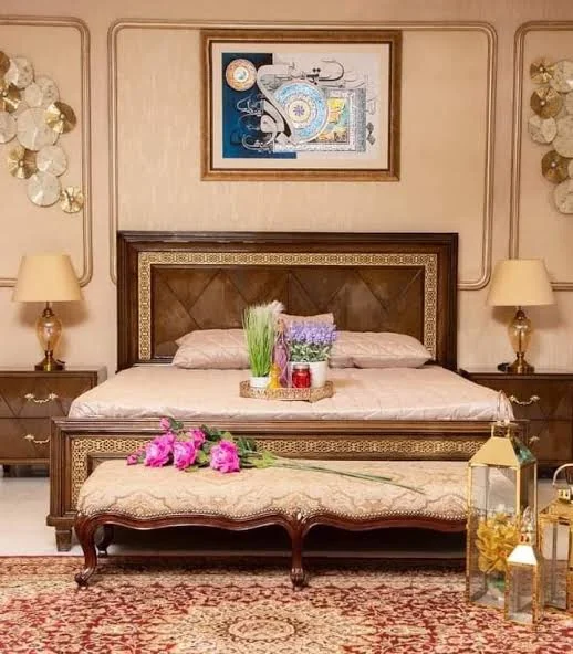 Hand-carved oak bed with matching bench.