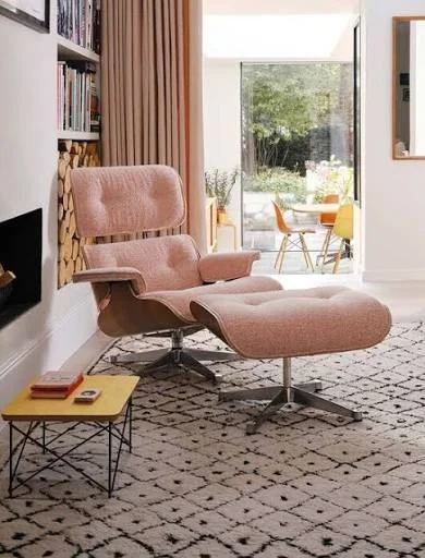 Bent-ply lounge chair and ottoman in pink wool blend.